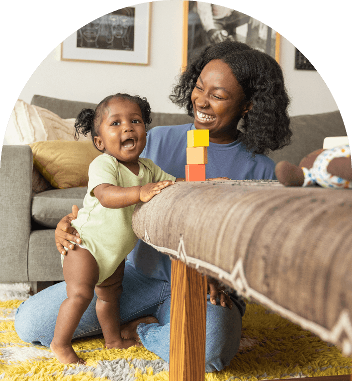 Mom with child stacking blocks from The Block Set by Lovevery